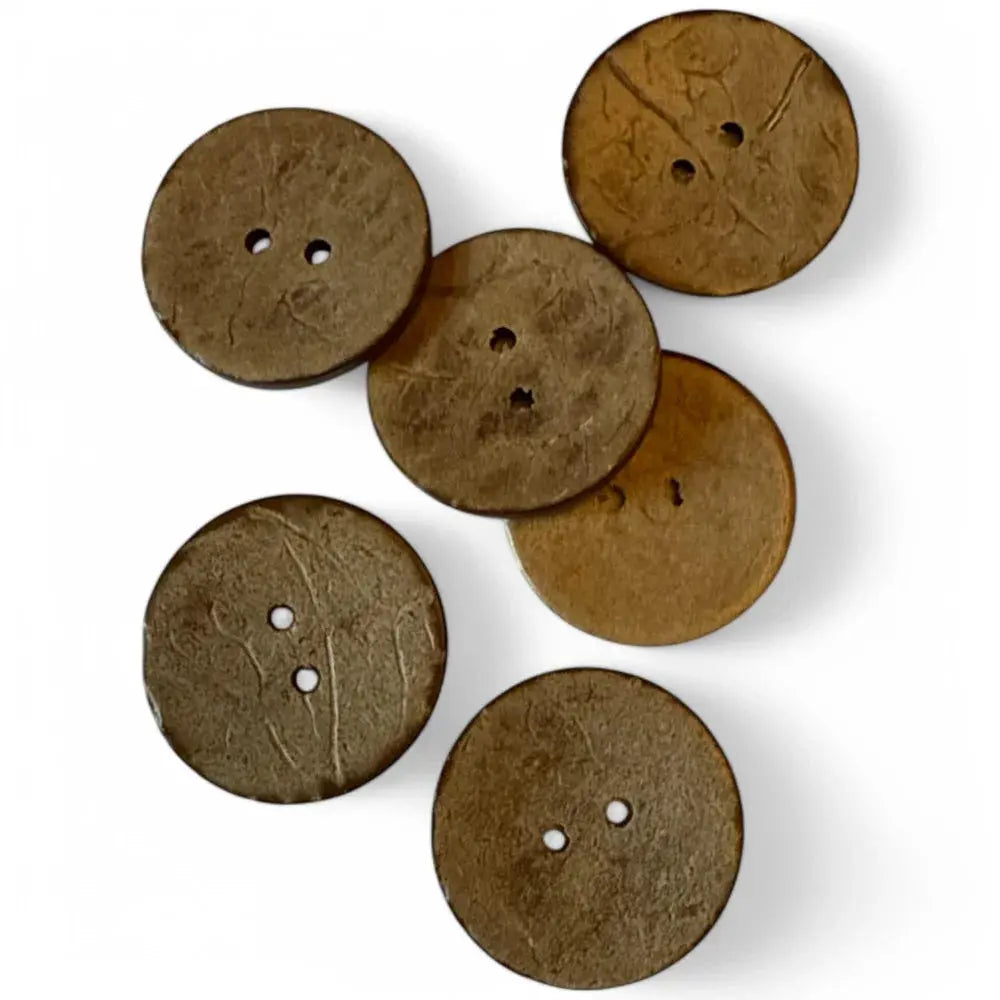 Six brown, round, two-hole buttons.