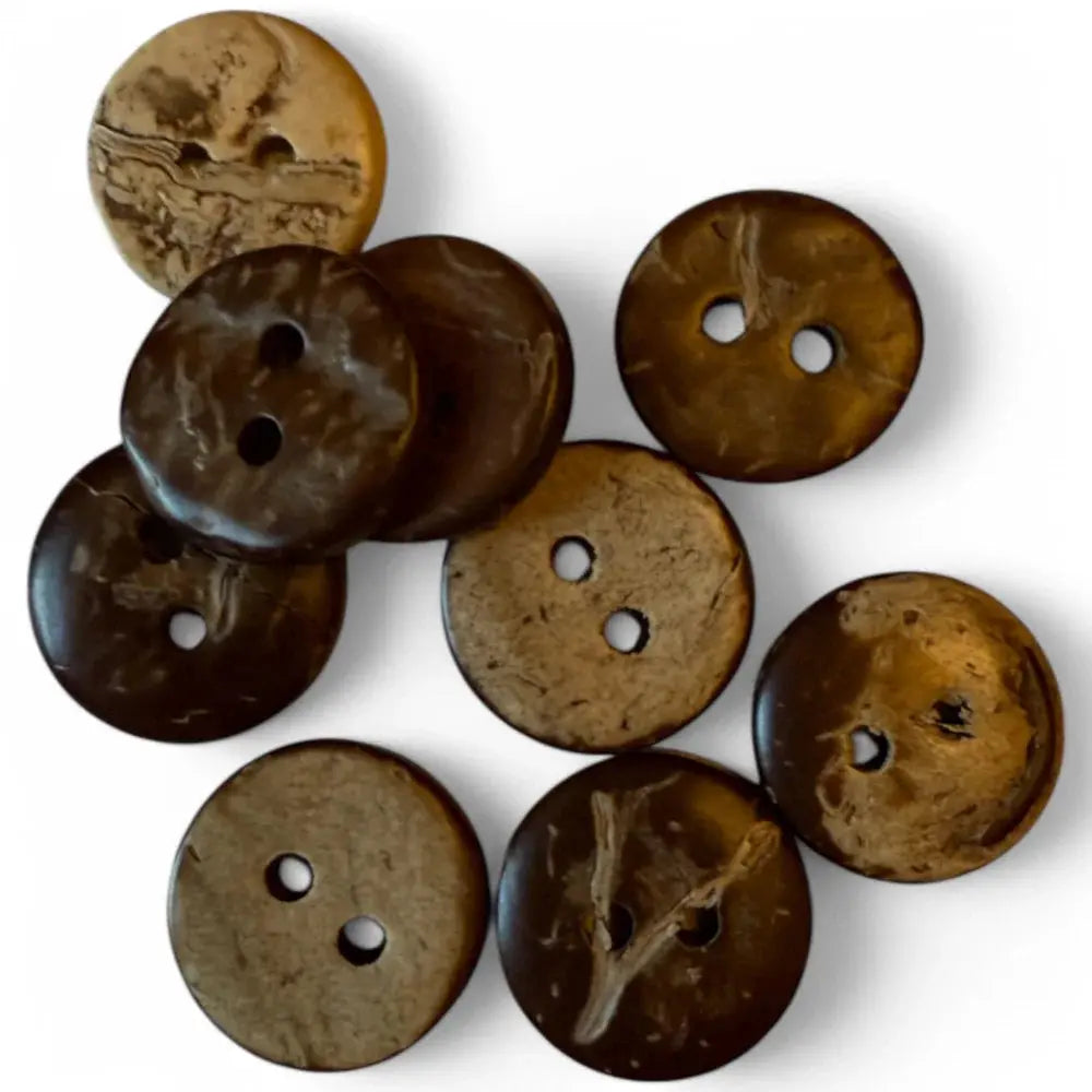Pile of two-hole coconut buttons.