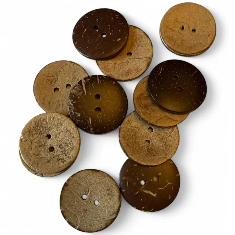 Pile of brown coconut buttons.