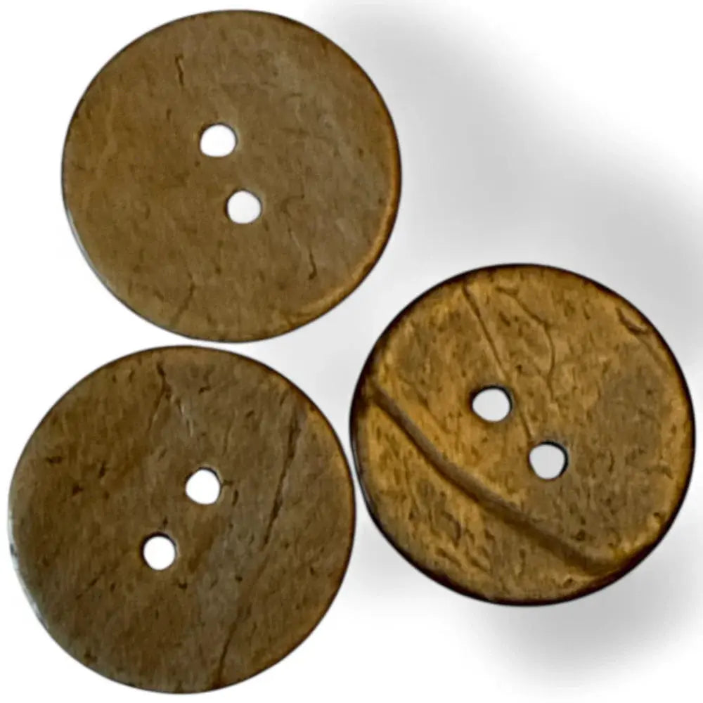 Three brown coconut buttons.