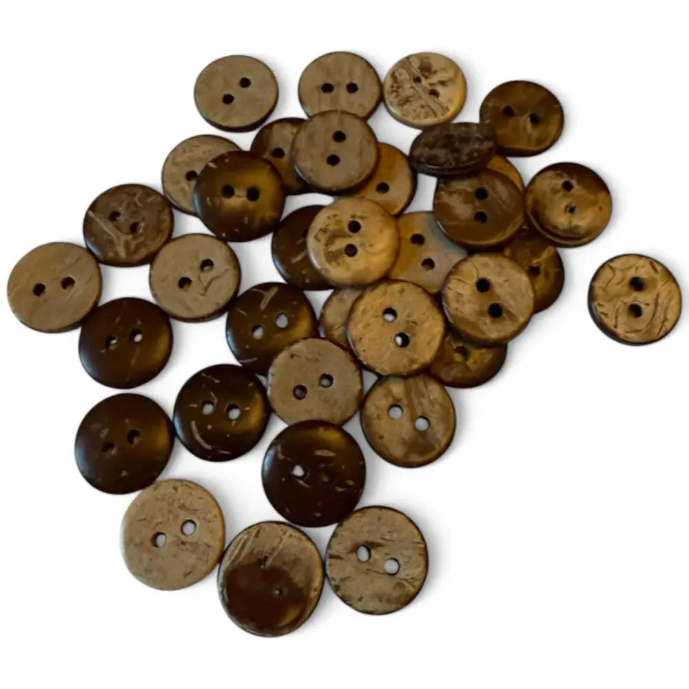 Pile of brown coconut buttons.