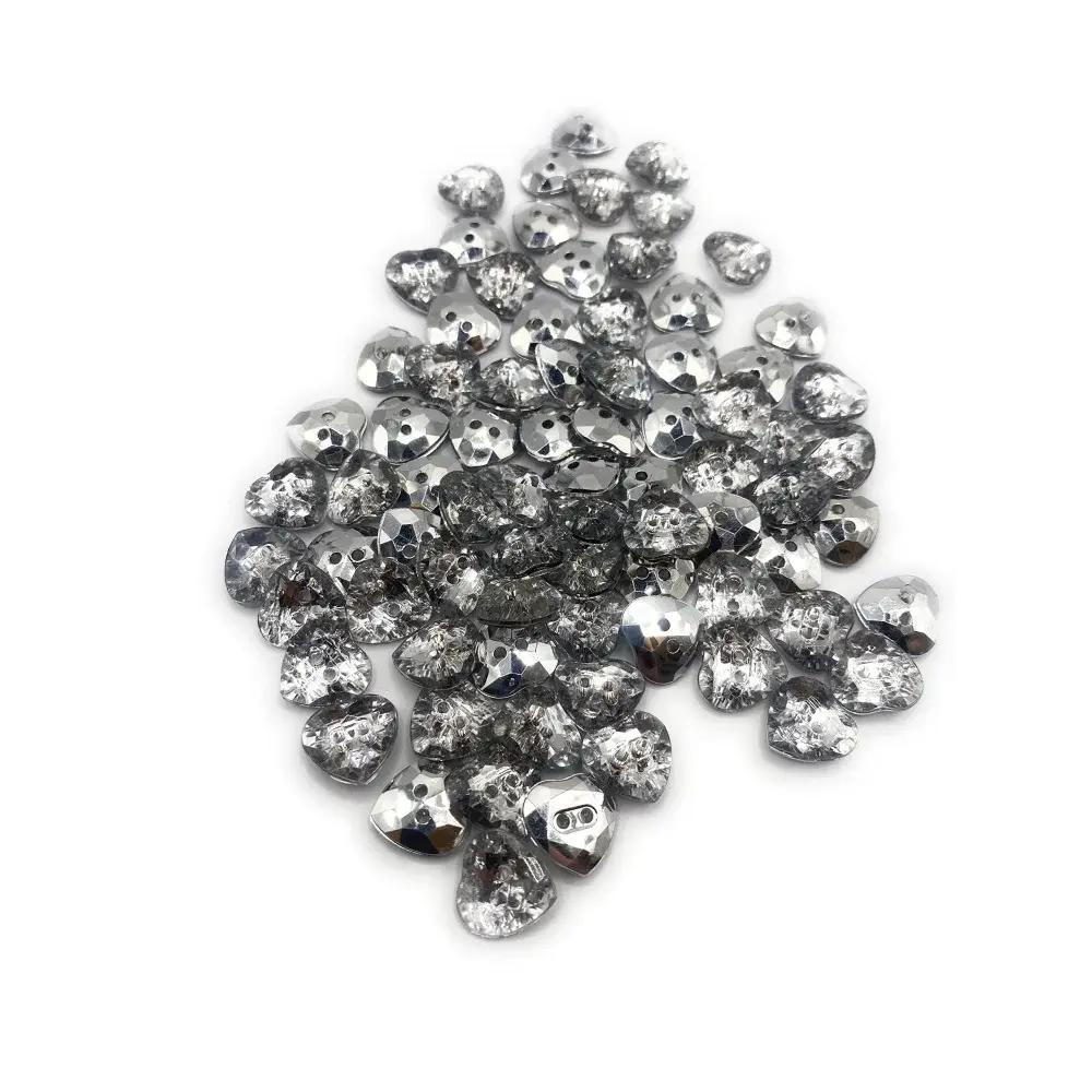 Pile of faceted silver beads.