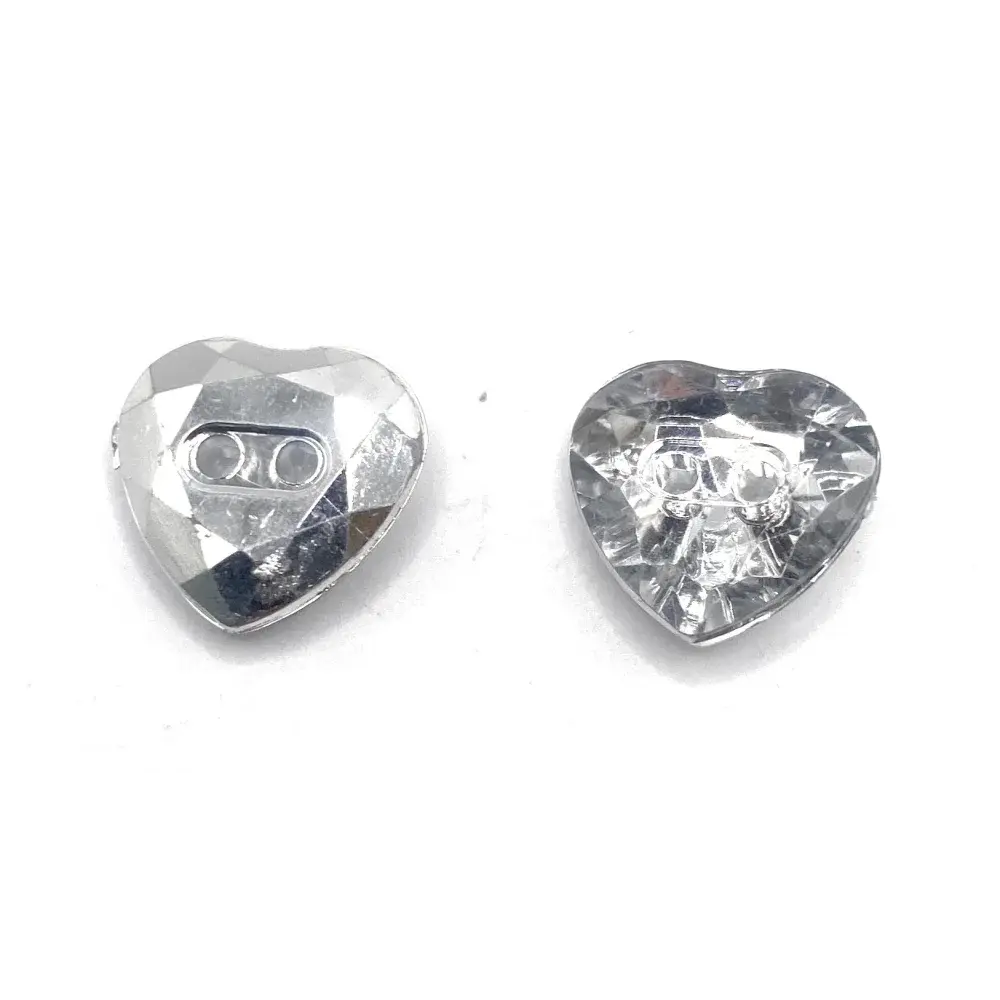 Two heart-shaped, faceted, clear buttons.