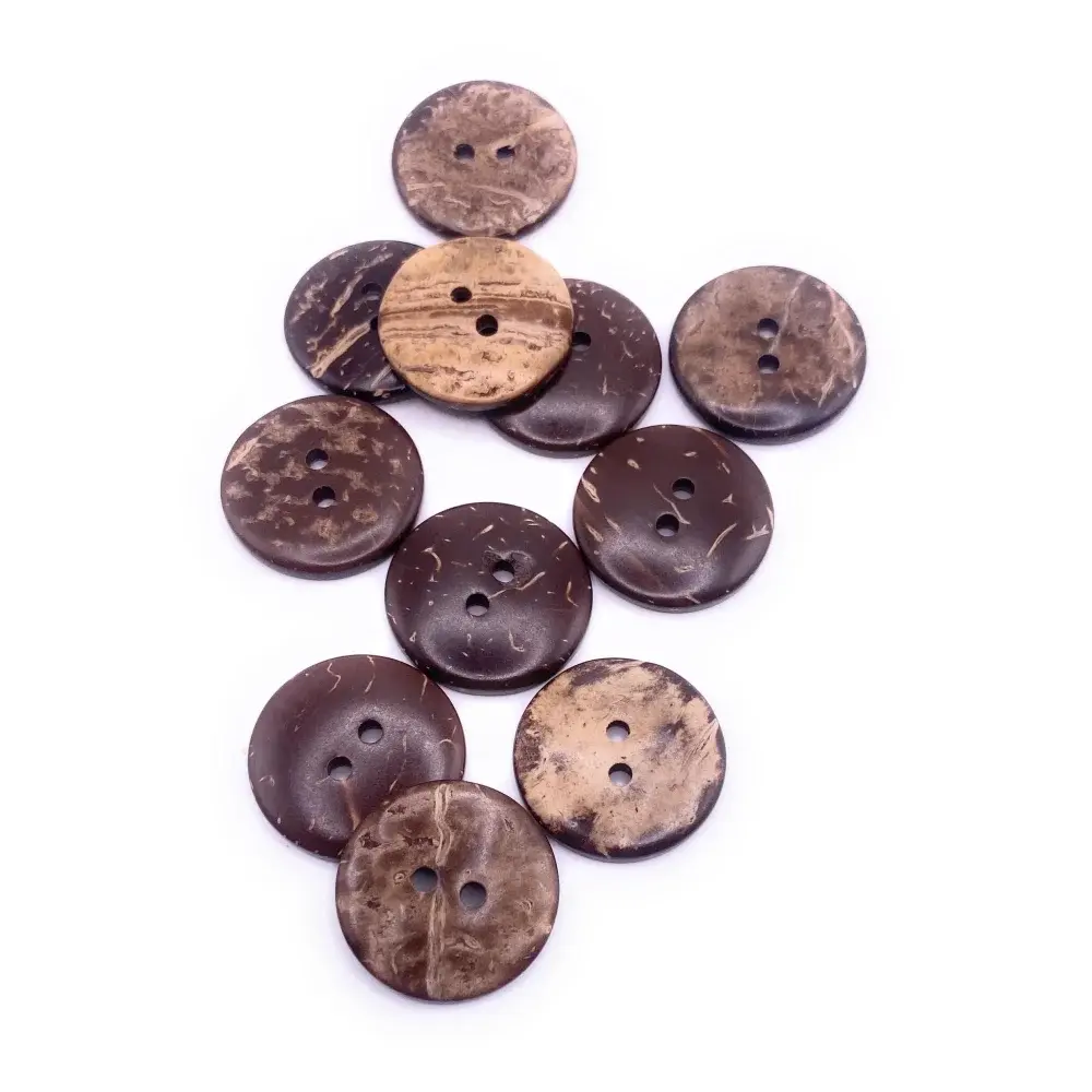 Pile of brown coconut buttons.