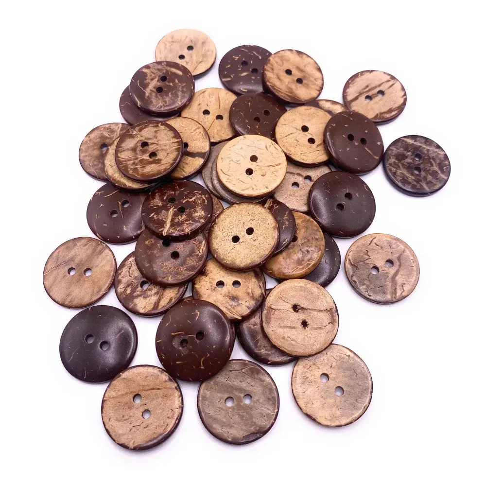 Pile of round, two-hole coconut buttons.