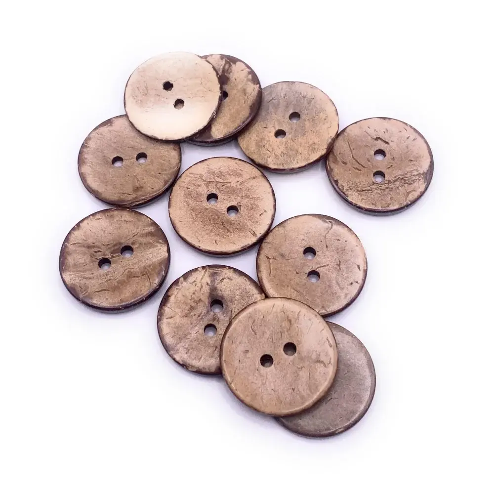Pile of brown coconut buttons.