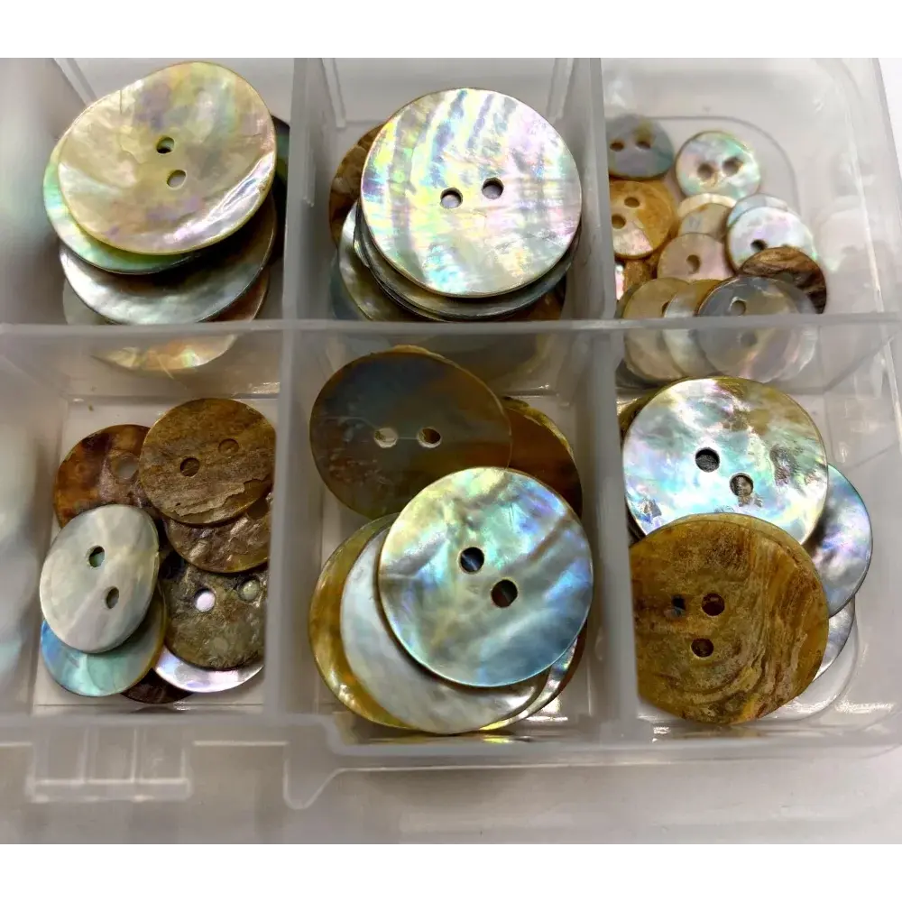 Assorted mother-of-pearl buttons.