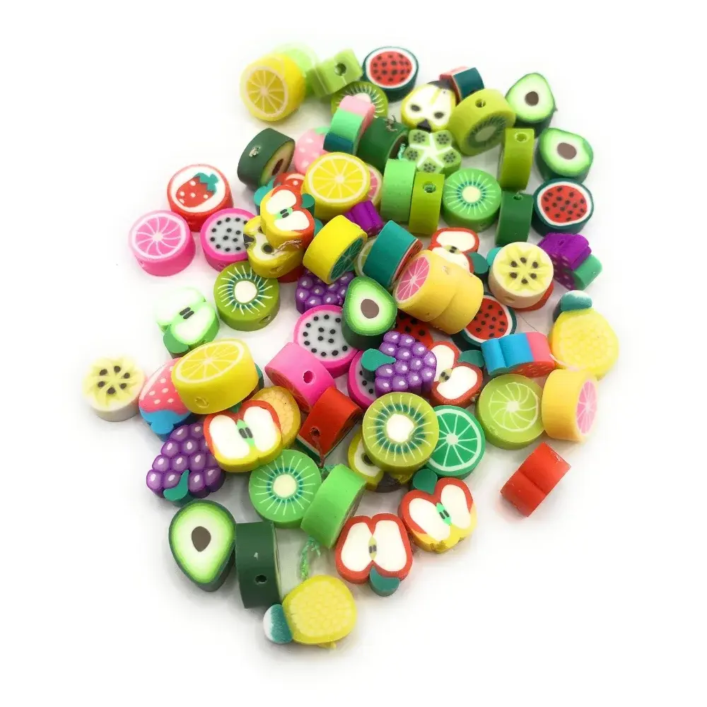 Colorful fruit-shaped polymer clay beads.
