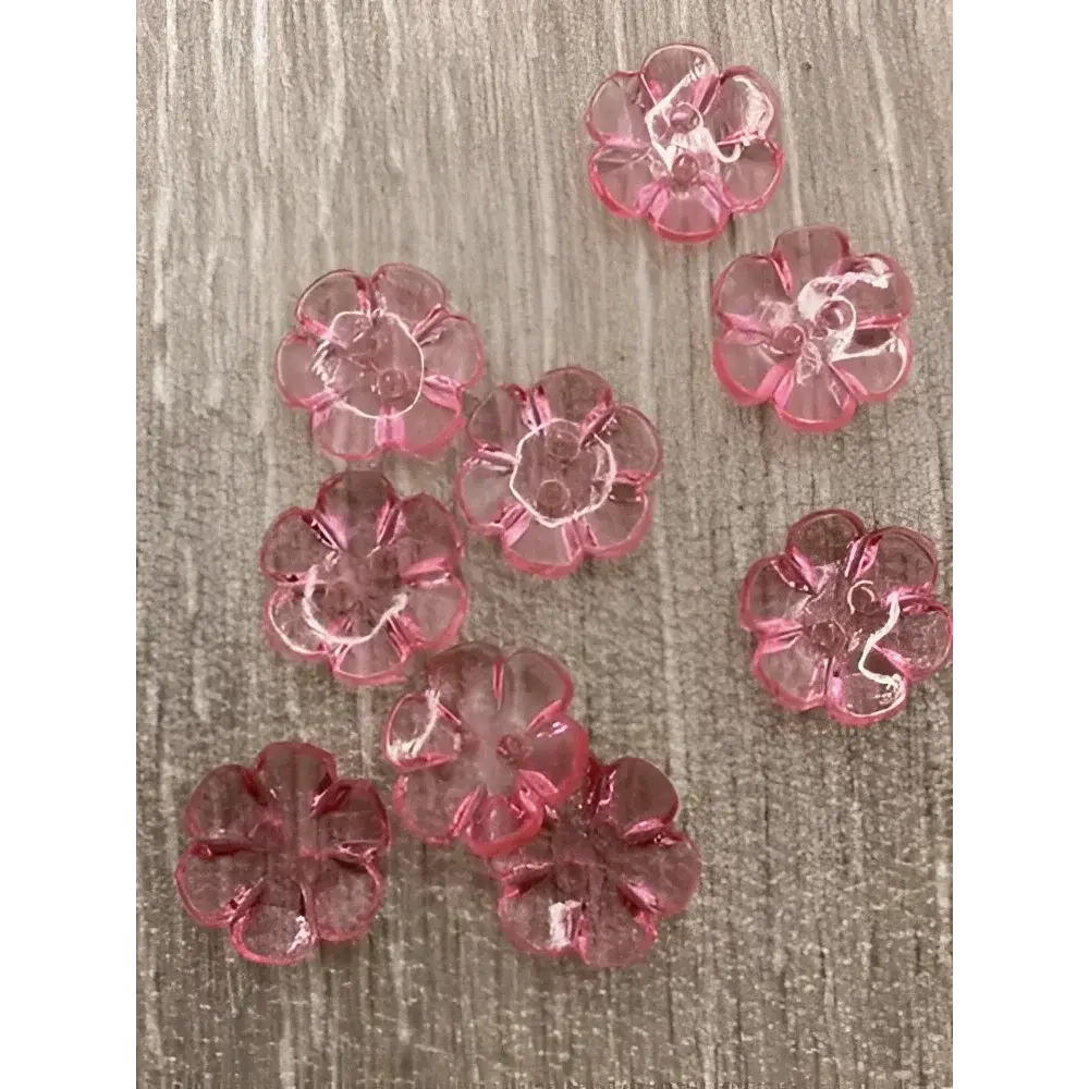 Translucent pink flower-shaped beads.