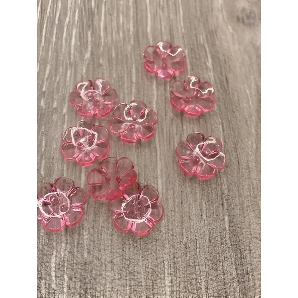 Pink flower-shaped buttons.