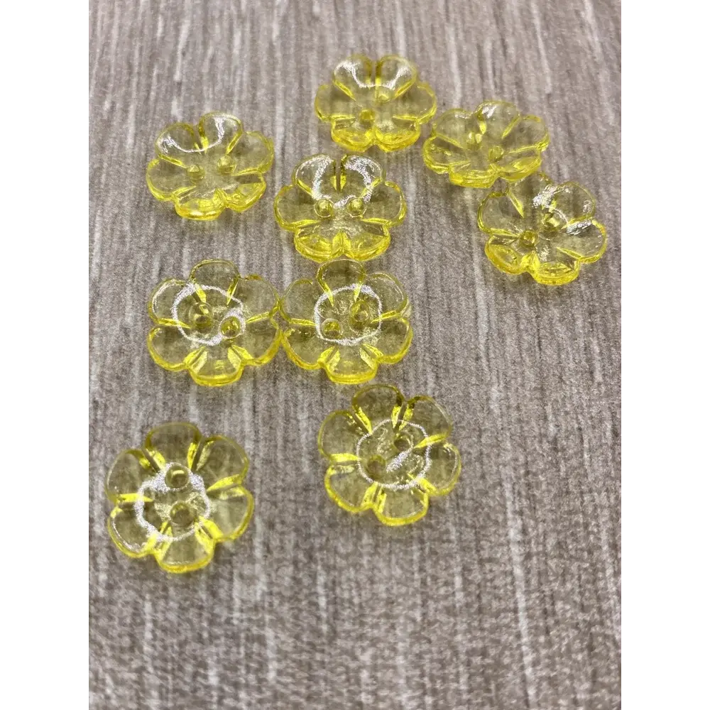 Yellow flower-shaped buttons.