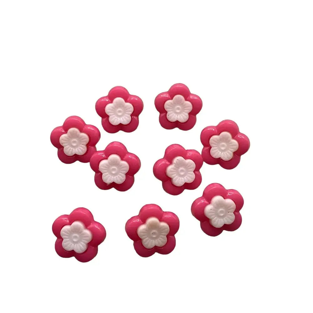 Pink and white flower-shaped buttons.