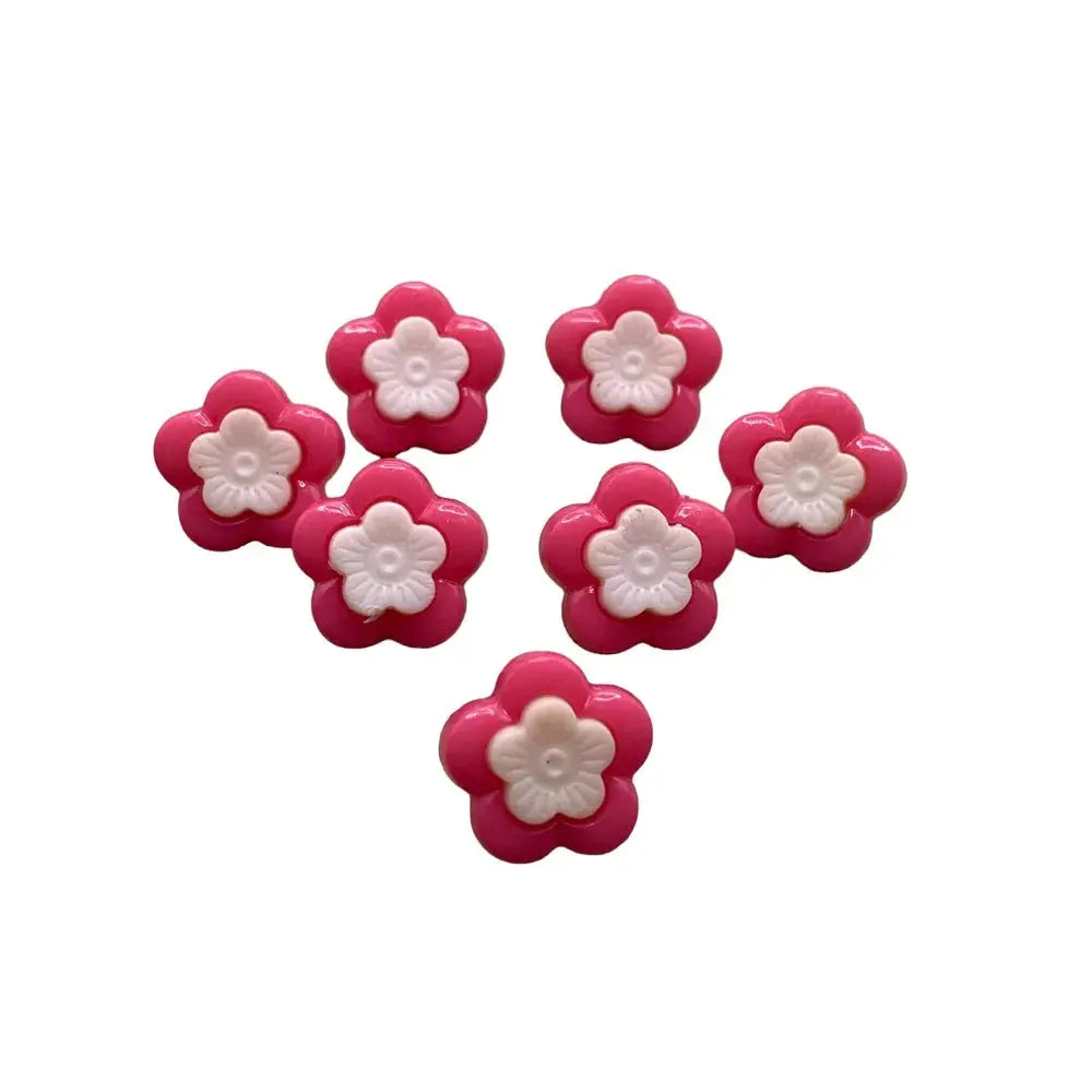 Pink and white flower-shaped buttons.