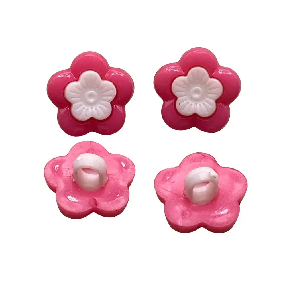 Four pink flower-shaped buttons.