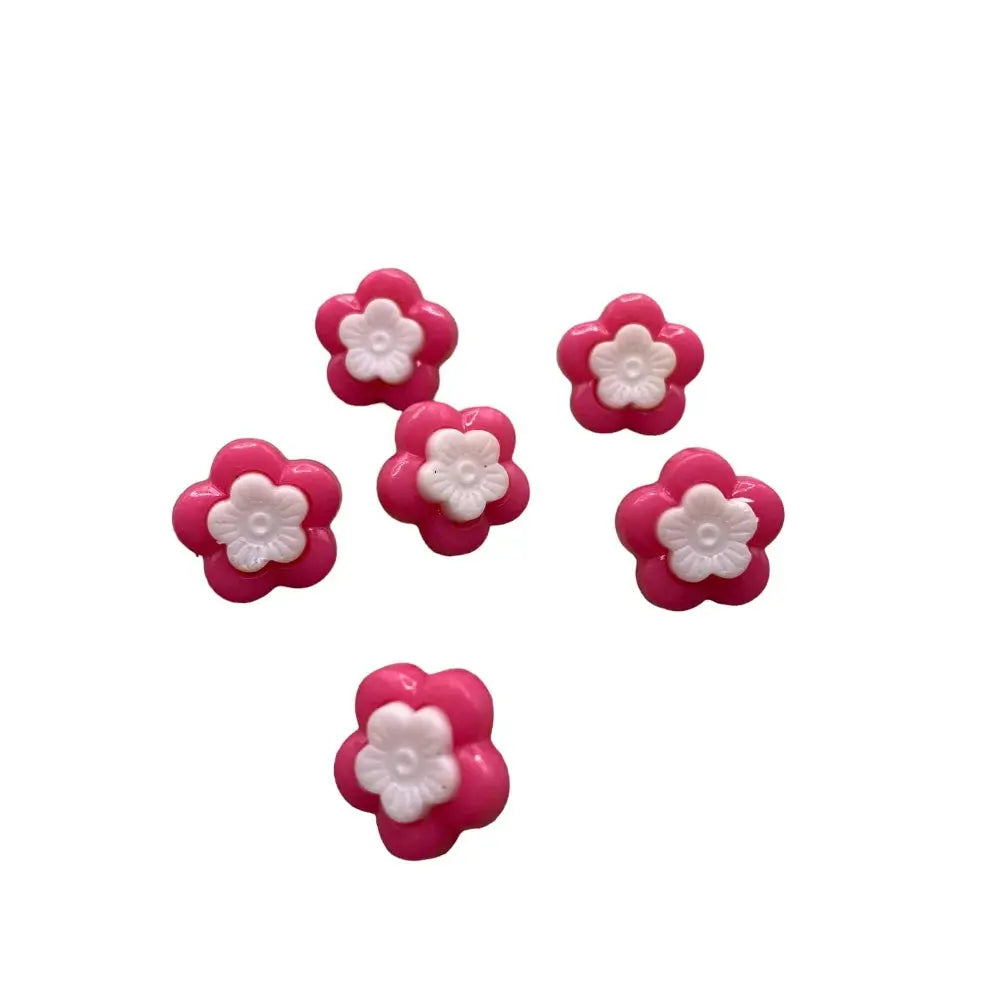 Pink and white flower-shaped buttons.