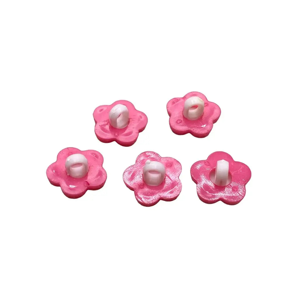 Pink flower-shaped shank buttons.