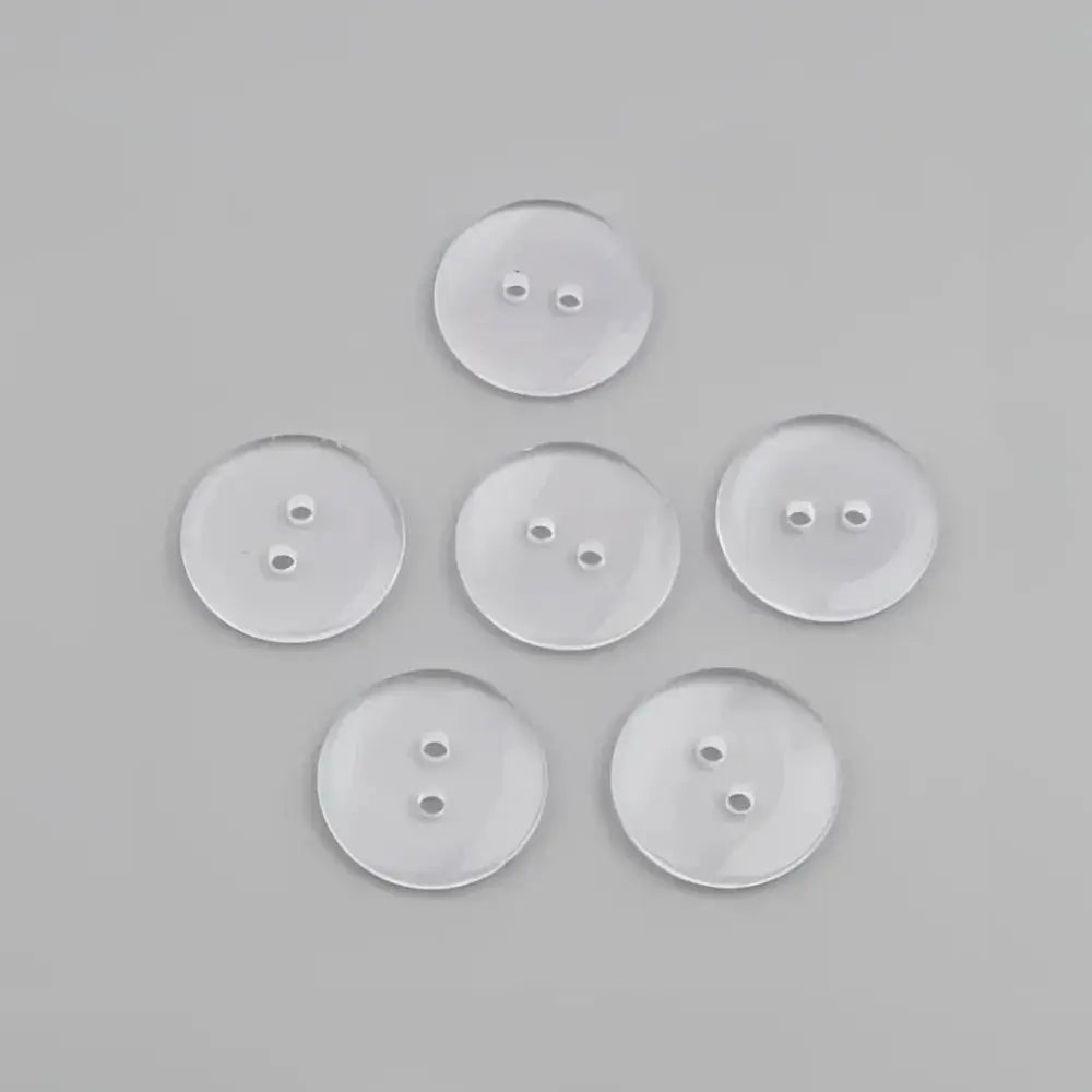 Translucent two-hole buttons.