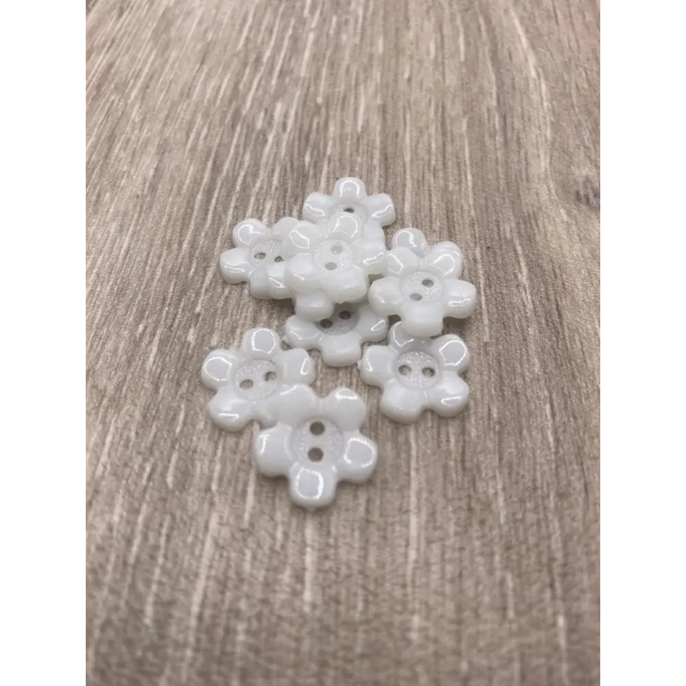 White flower-shaped buttons.