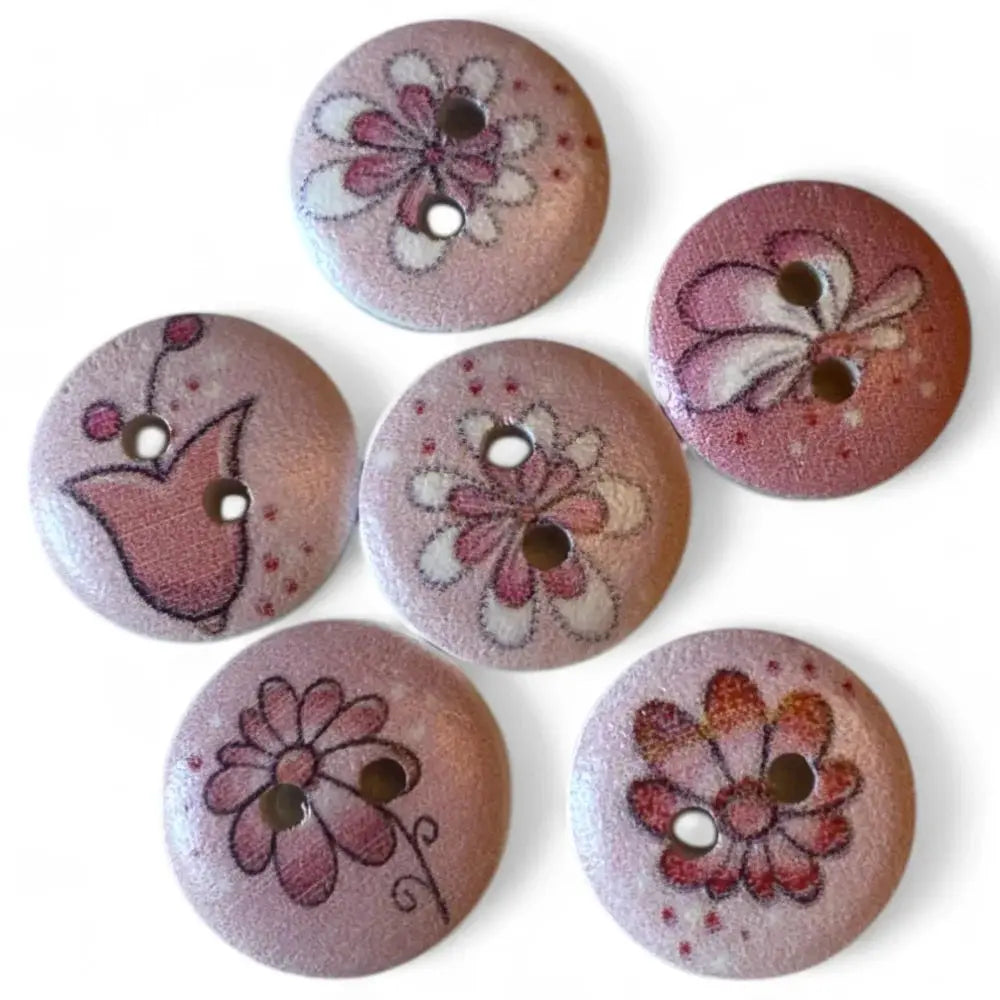 Round, pink, floral-patterned buttons.