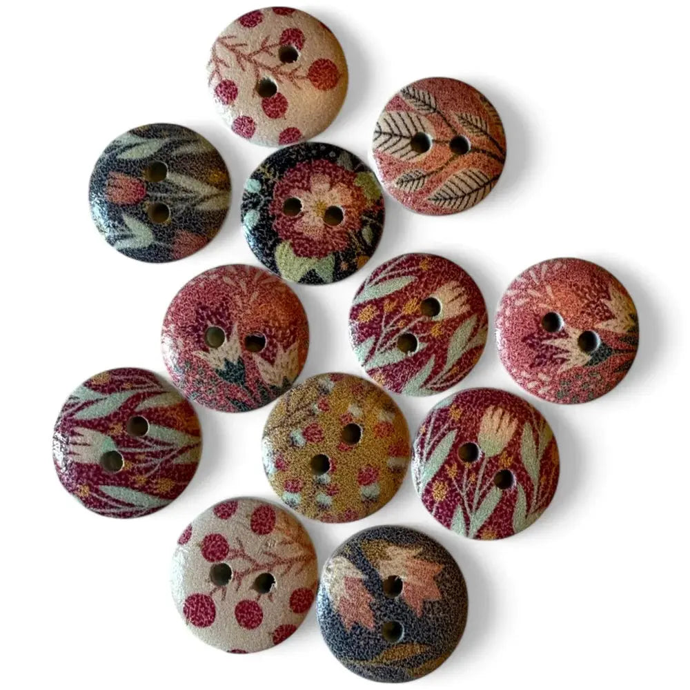 Assorted floral patterned wooden buttons.