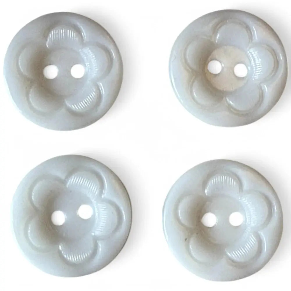 Four flower-shaped, two-hole buttons.