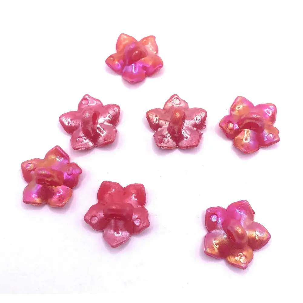 Iridescent pink flower-shaped beads.