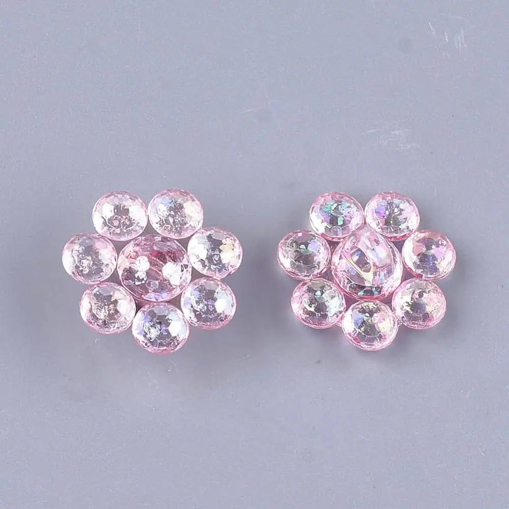 Two pink crystal flower embellishments.