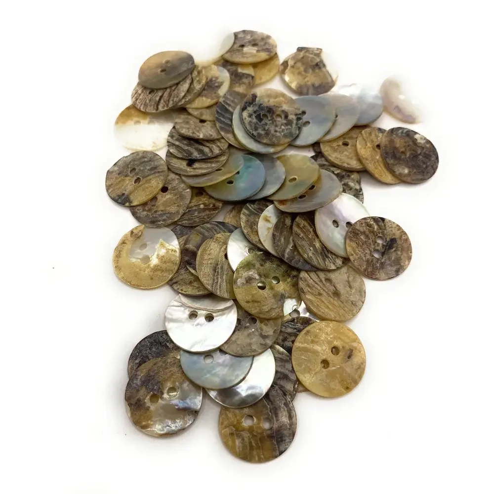 Pile of iridescent shell buttons.