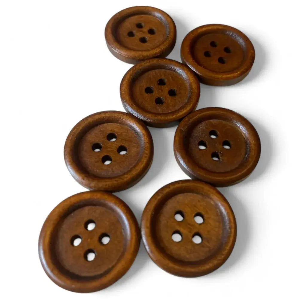 Seven brown wooden buttons.