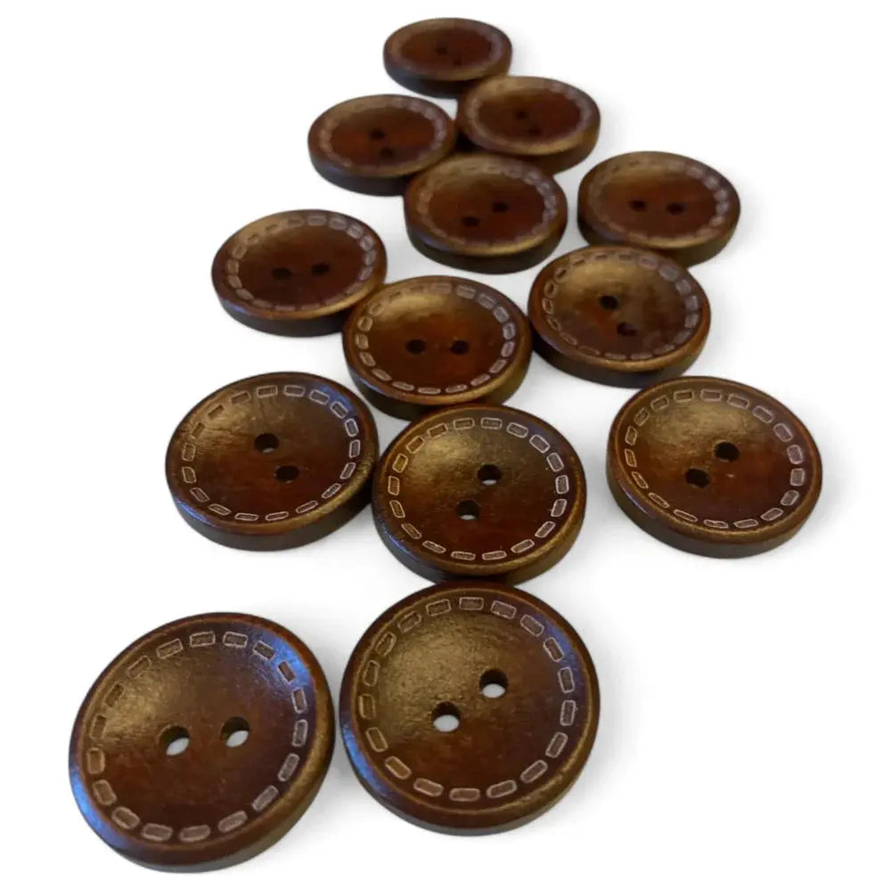 Brown wooden buttons with decorative stitching.
