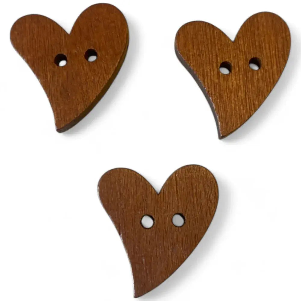 Three brown wooden heart buttons.