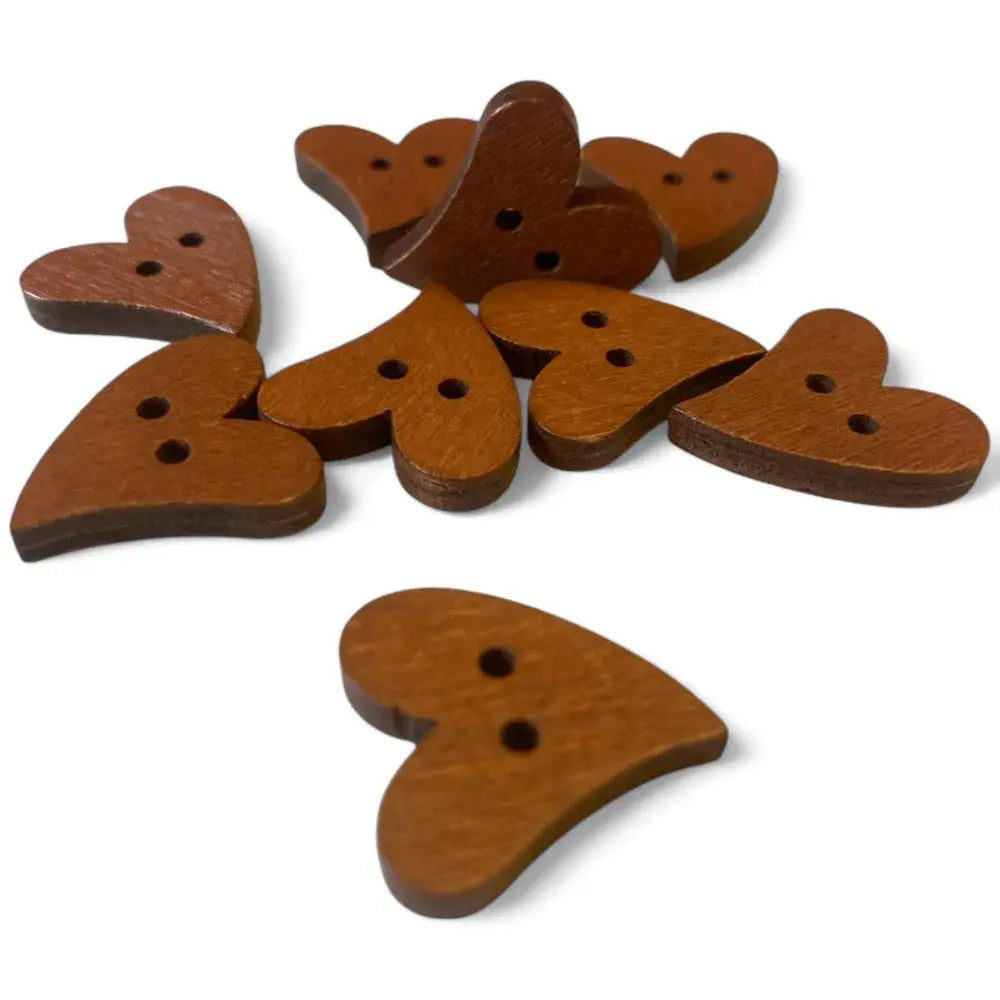 Brown heart-shaped buttons with two holes.