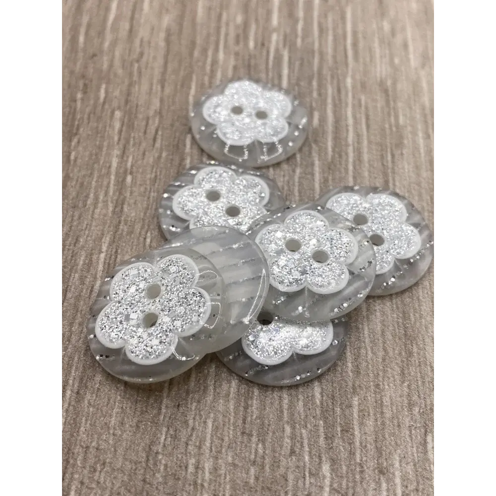 Sparkly flower-shaped buttons.