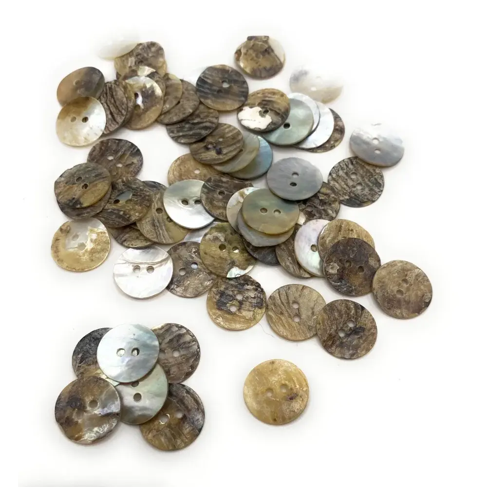 Pile of two-hole shell buttons.