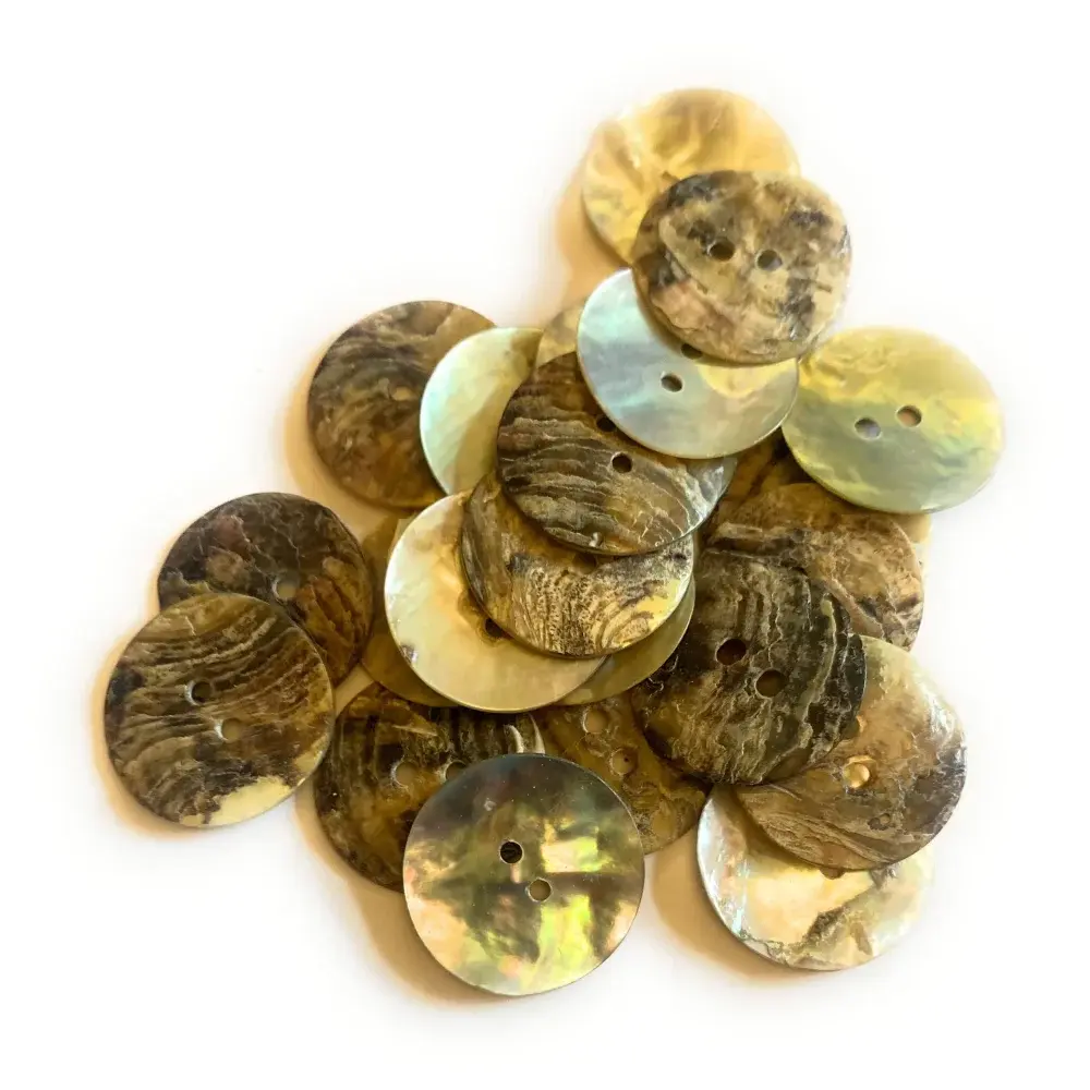 Pile of iridescent shell buttons.
