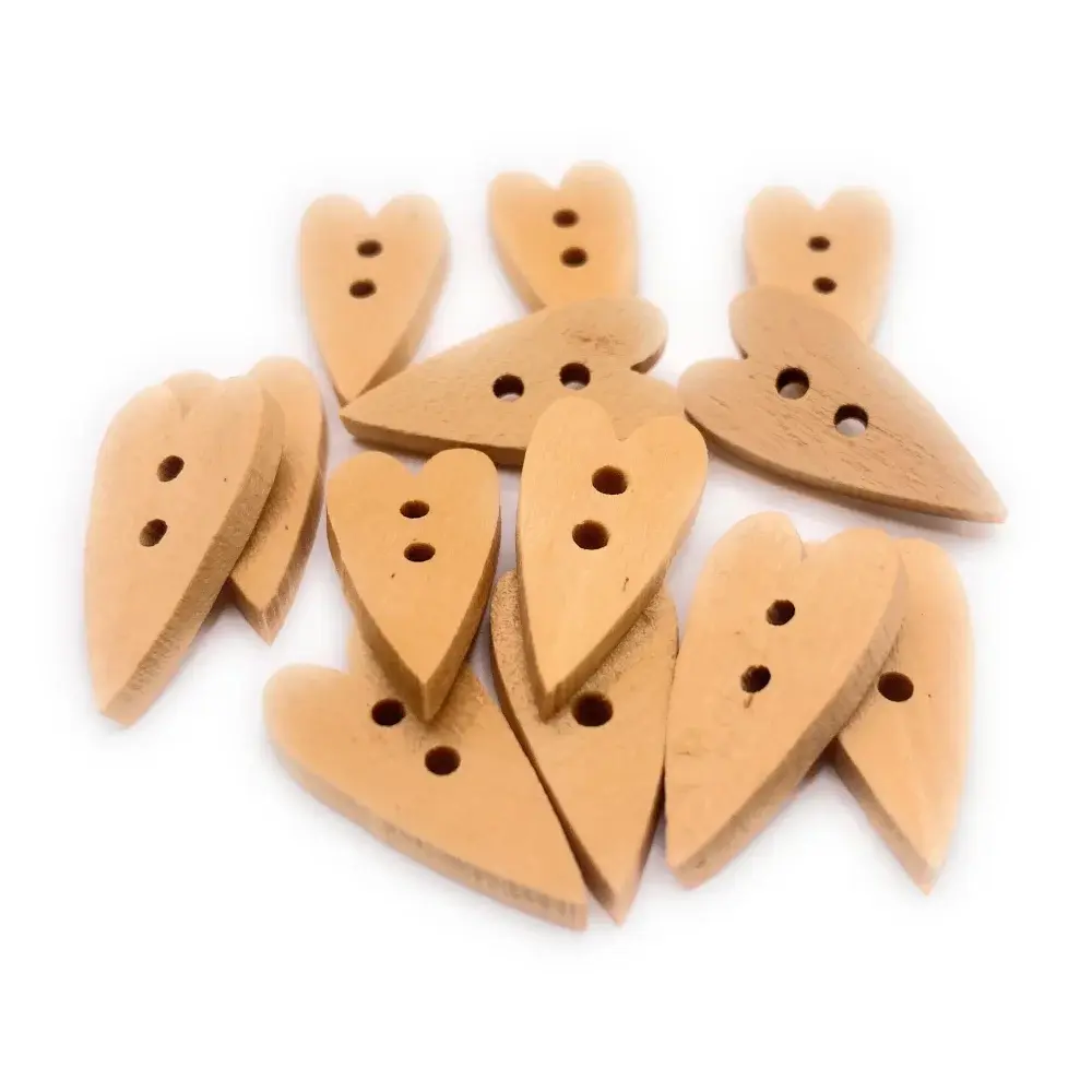 Heart-shaped wooden buttons with two holes.