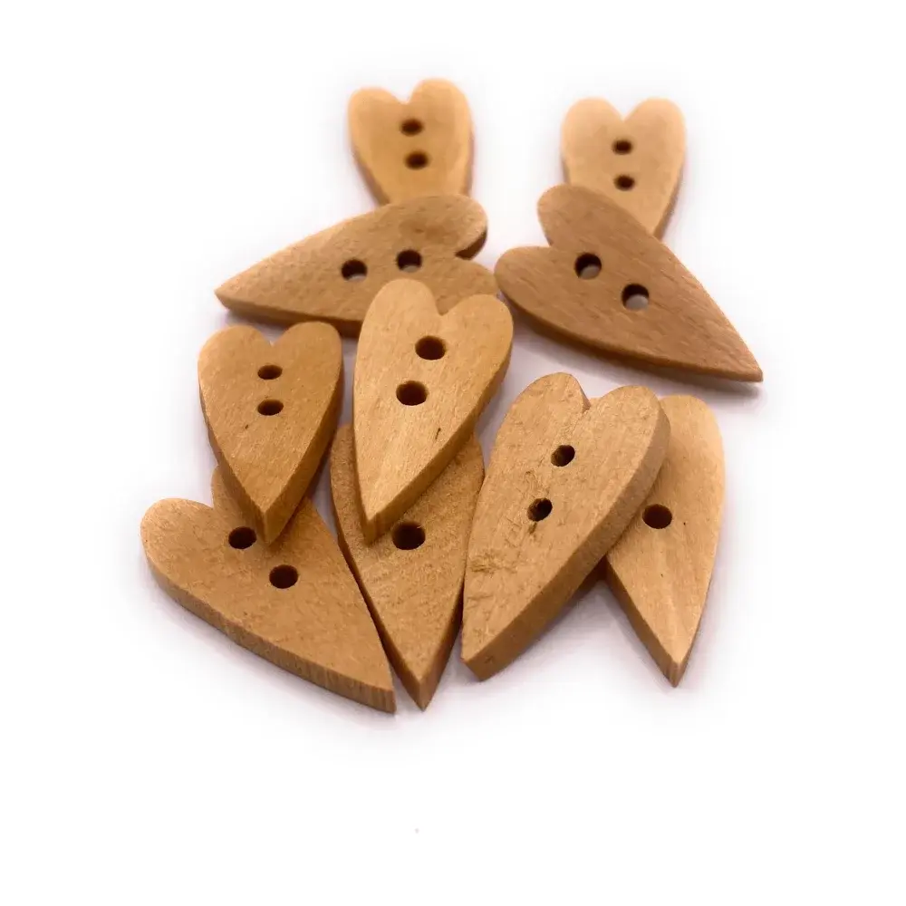Heart-shaped wooden buttons with two holes.