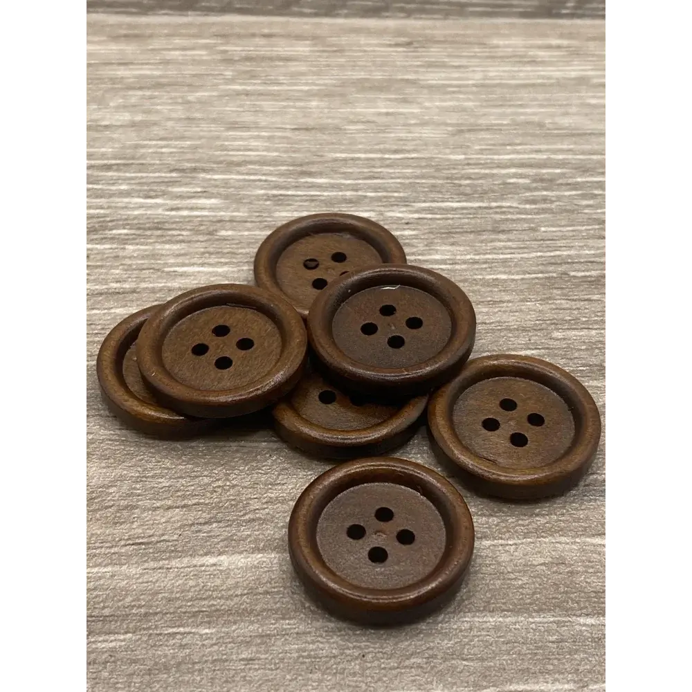 Brown wooden four-hole buttons.