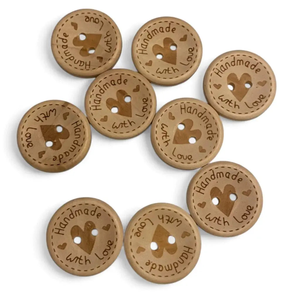 Wooden craft buttons with heart design.