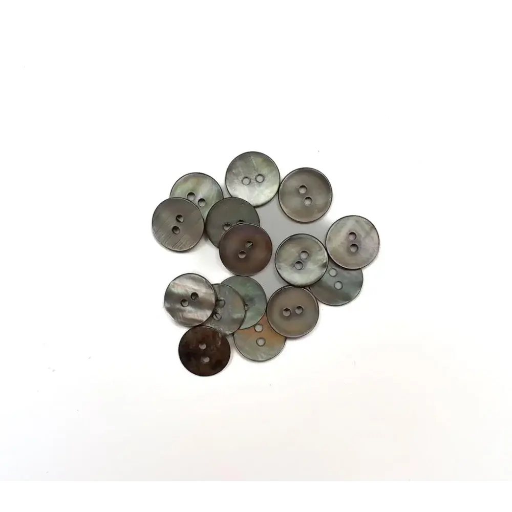 Pile of gray two-hole buttons.