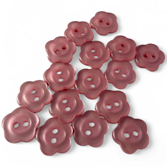 Pink flower-shaped buttons.