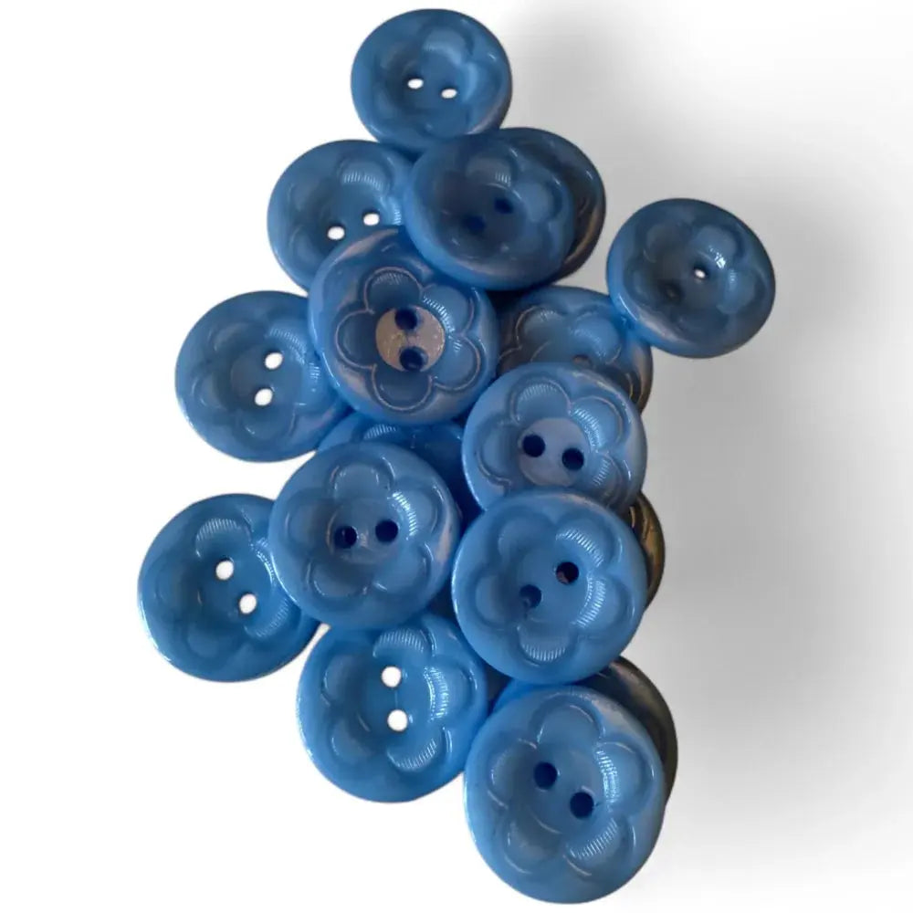 Pile of blue buttons.