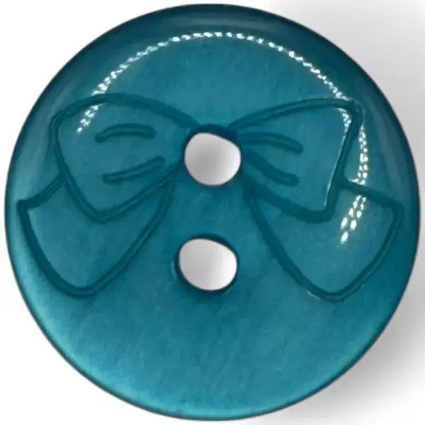 Teal button with bow design.