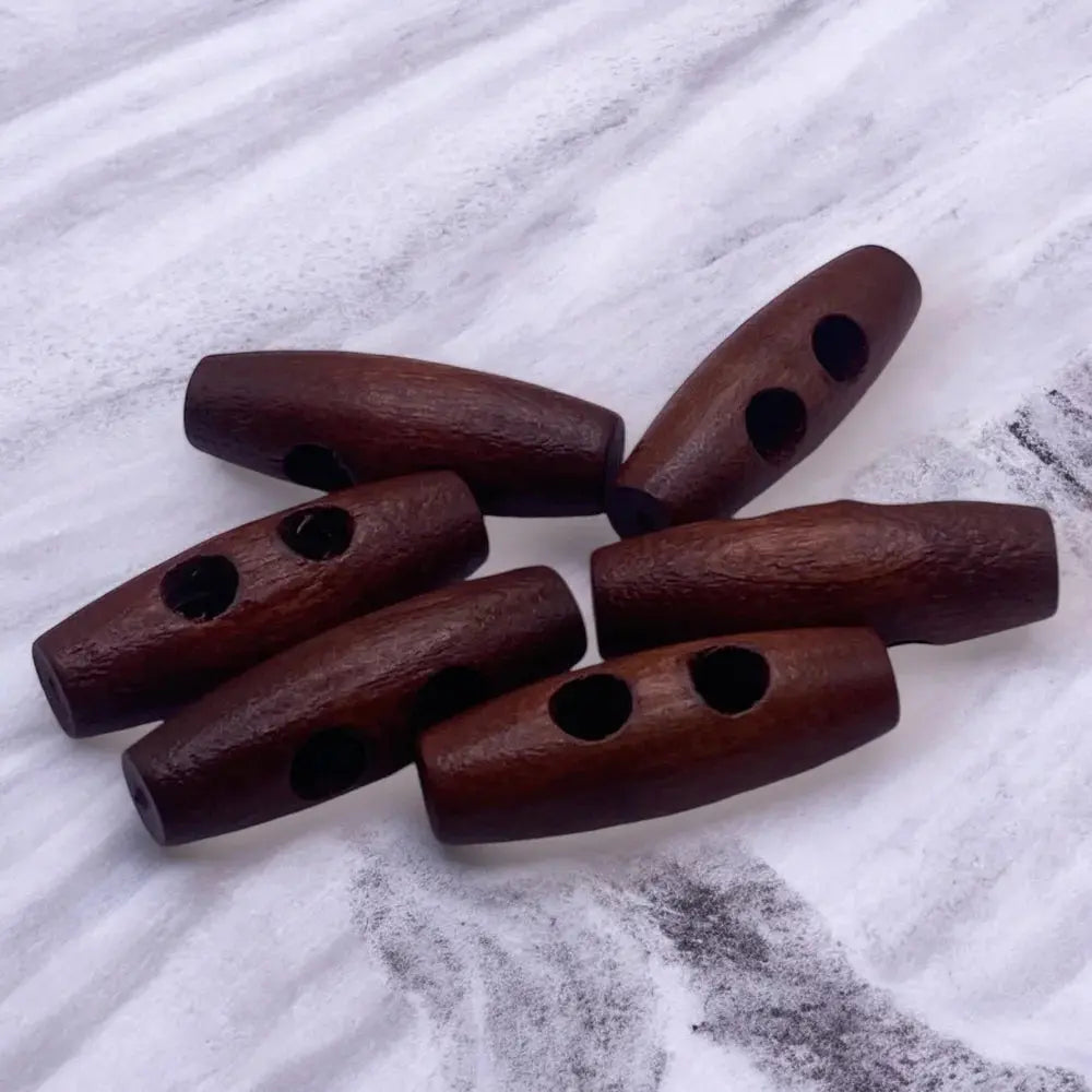 Dark brown toggle buttons.