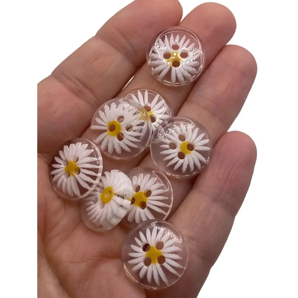 Daisy-themed clear buttons.