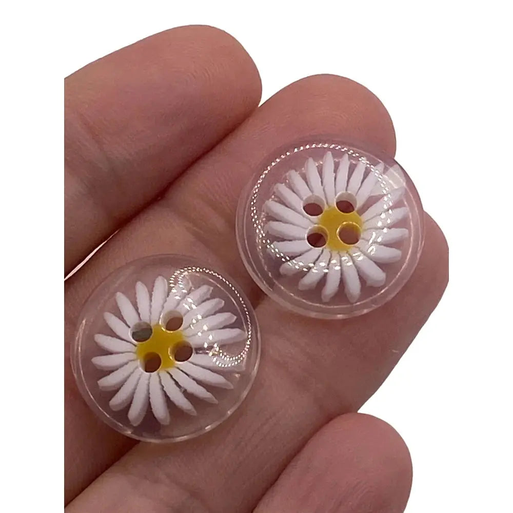 Two daisy-themed buttons.