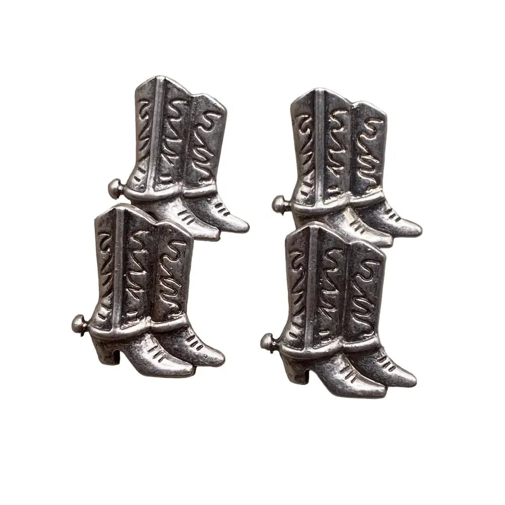 Silver cowboy boot cufflinks.