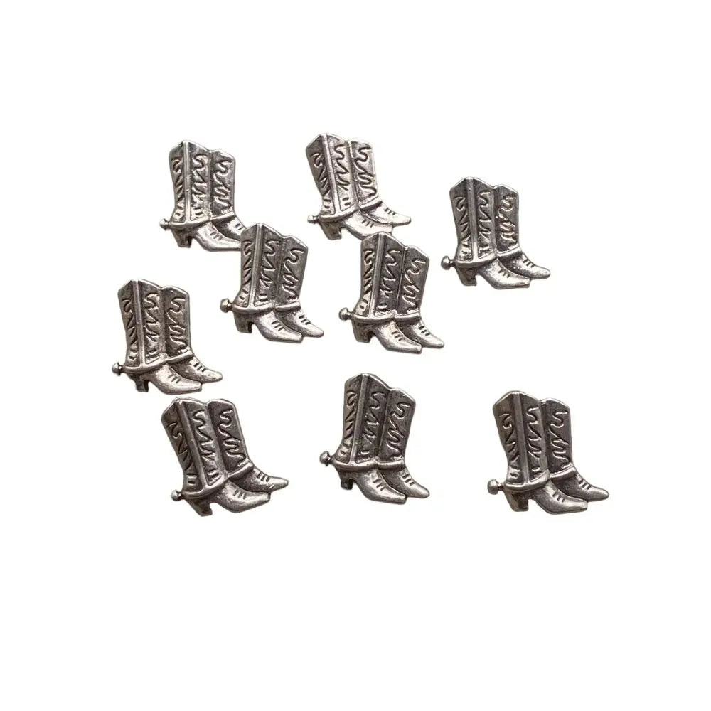 Silver cowboy boot charms.