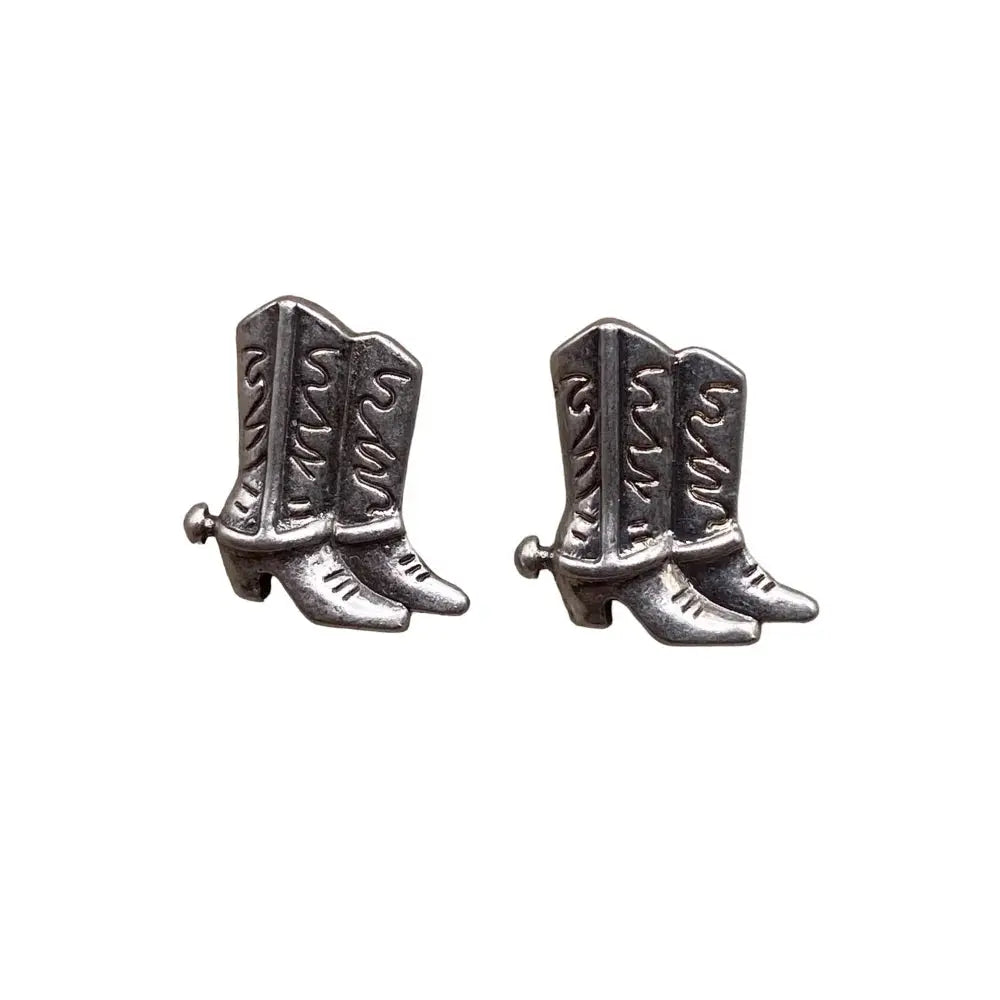 Pair of silver cowboy boot earrings.