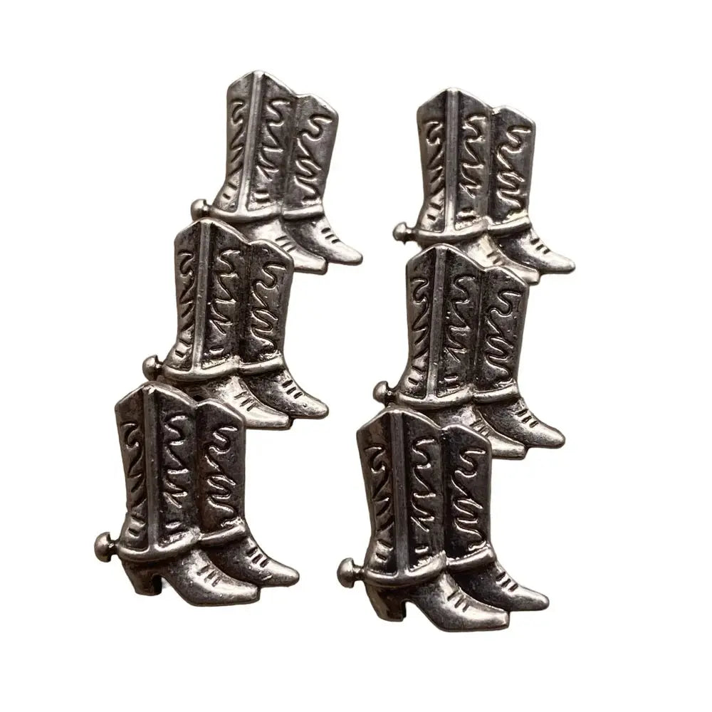Silver cowboy boot charms.